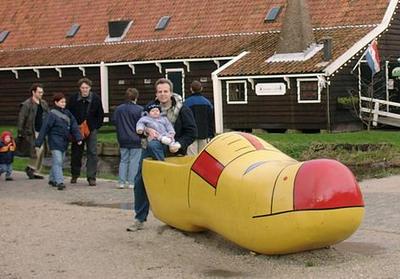 Emma & Alf in front of a clog factory.